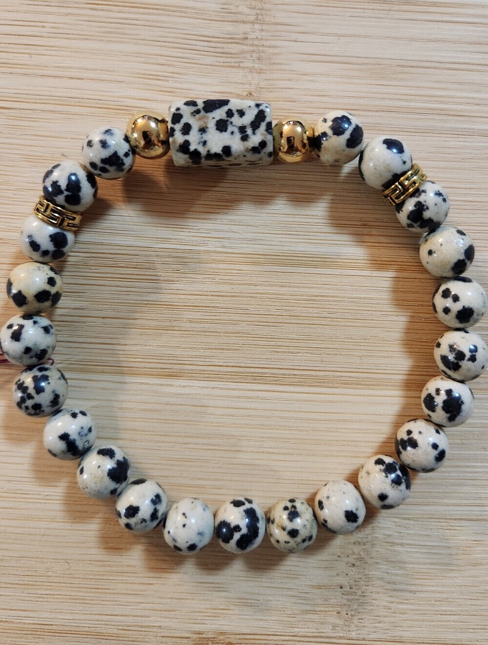 Hand Crafted Dalmatian Jasper Stretch Bracelet With Gold Accents Black Beige